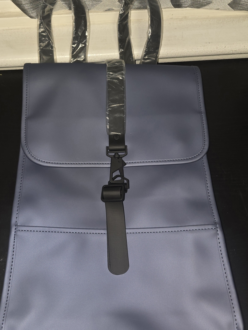 Rains Matte Blue Minimalist Backpack